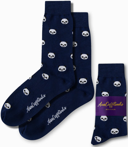 Panda Socks boast a dark blue design adorned with small white skull patterns, combining monochrome flair with the comfort of "AusCufflinks Australia" branding.