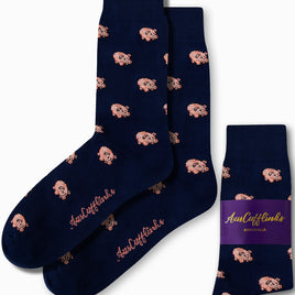 The "Piggy Bank Socks" in navy blue exude fashion and comfort with their small pink sheep patterns, featuring the "AusCufflinks Australia" branding.