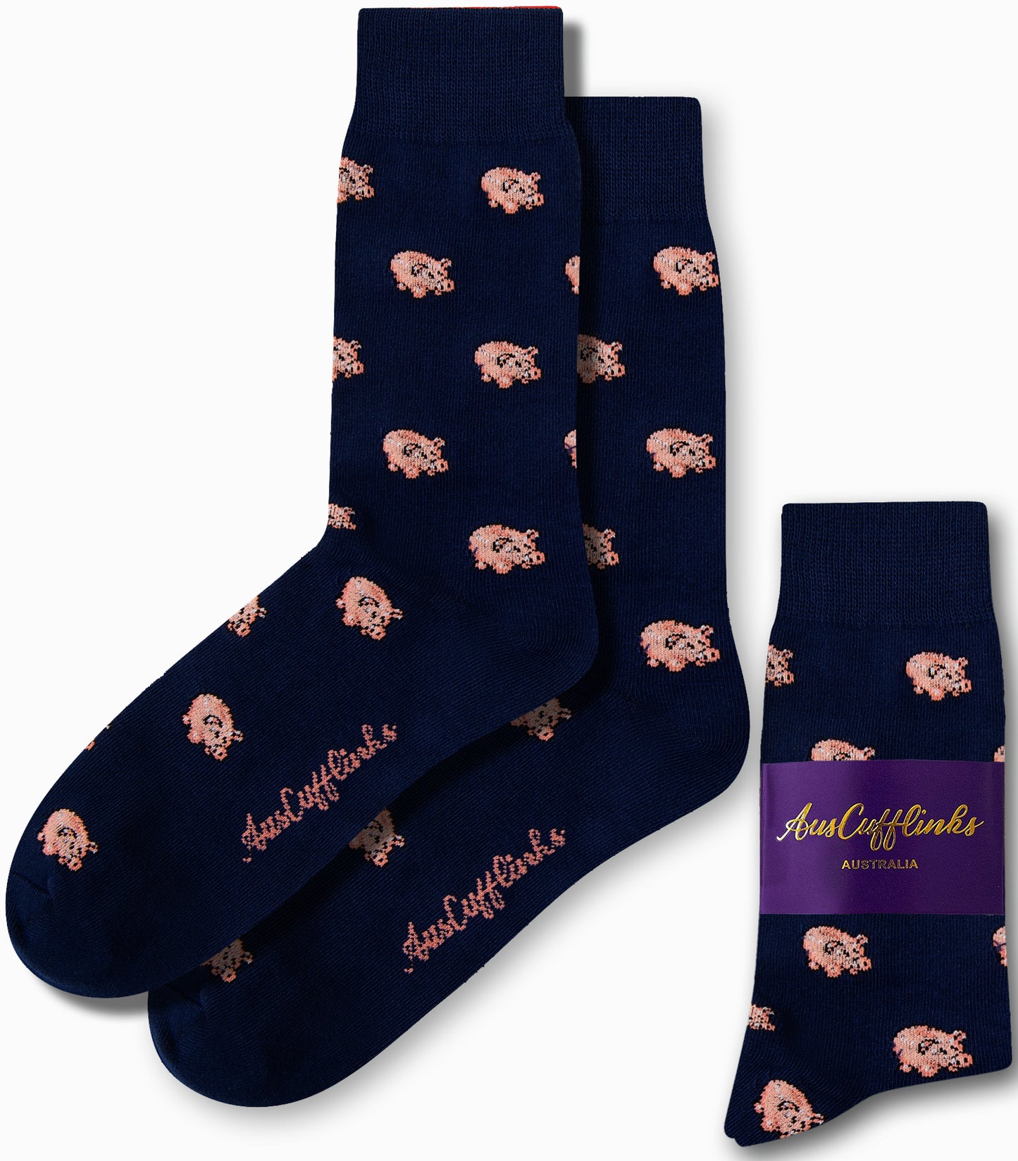 The "Piggy Bank Socks" in navy blue exude fashion and comfort with their small pink sheep patterns, featuring the "AusCufflinks Australia" branding.