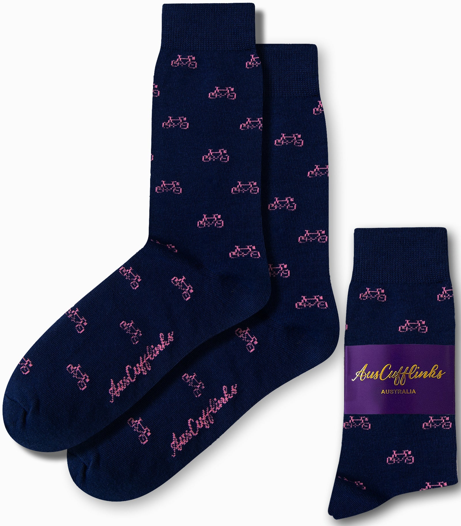 Navy socks featuring pink bicycle designs, packaged with a label reading "AusCufflinks Australia.