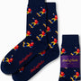 Skateboarder Socks in dark blue with a vibrant red and yellow parrot pattern, providing street-smart comfort. The packaging showcases "AusCufflinks Australia" with pride.