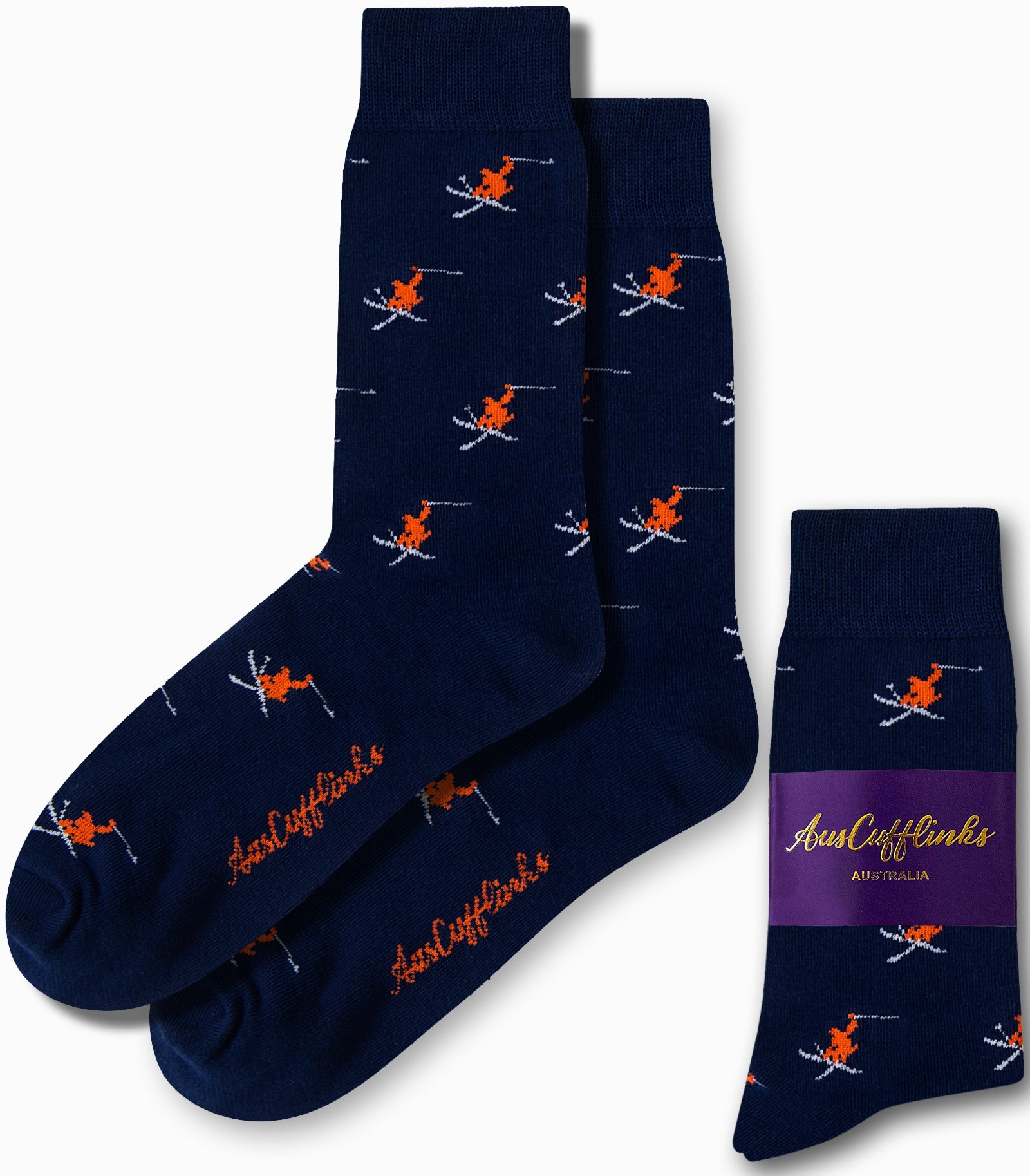 The "Eiffel Tower Socks" exude Parisian panache with their navy blue color and orange skier pattern, proudly featuring the "AusCufflinks" branding and packaged with a purple label.