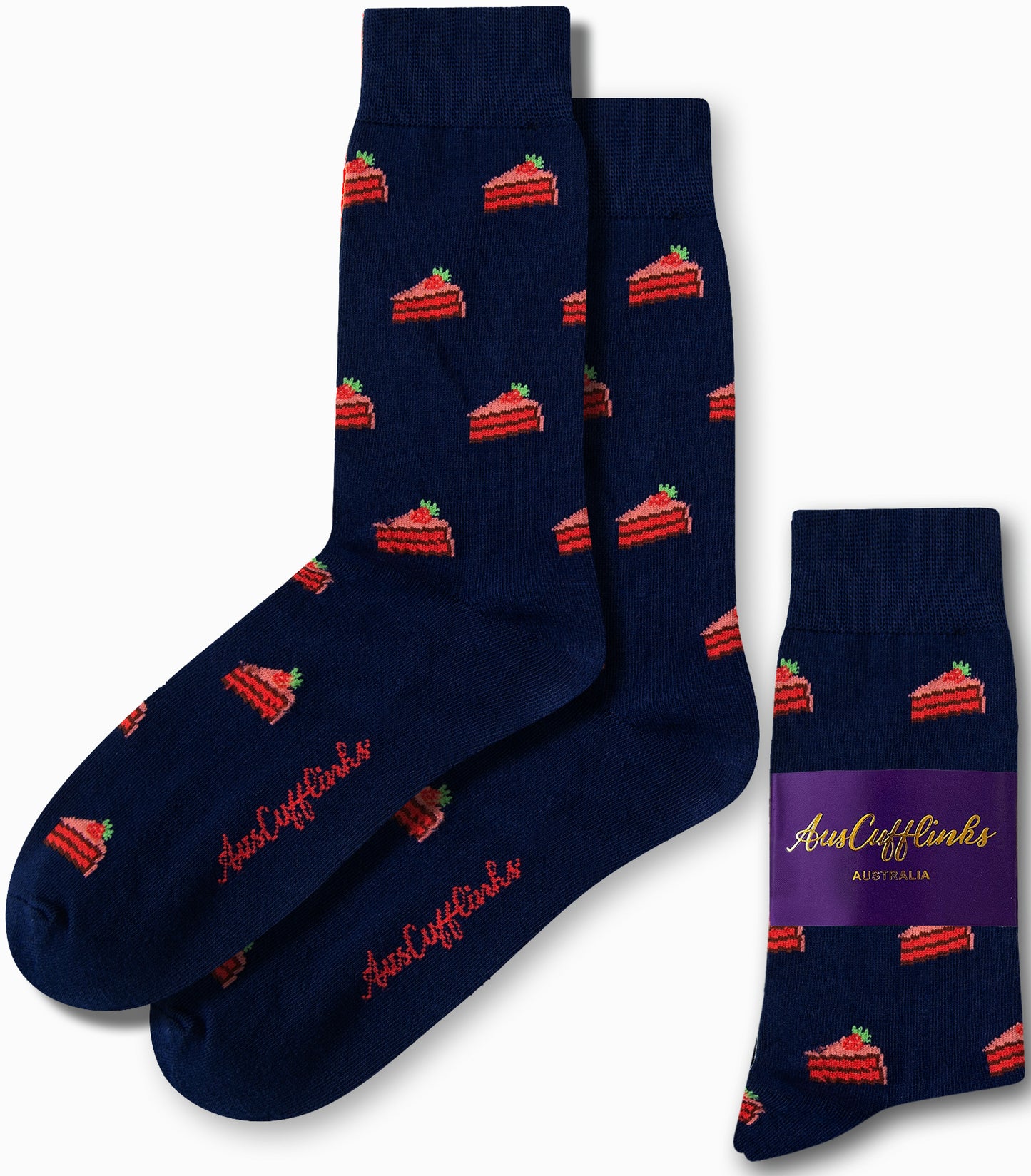 Navy blue socks featuring a charming red cake slice pattern, packaged with a purple label that reads "Strawberry Cake Socks by AusCufflinks Australia.