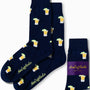 The Tequila Socks showcase a lively navy blue design adorned with a pattern of beer mugs and limes, packaged under the "AusCufflinks Australia" label.