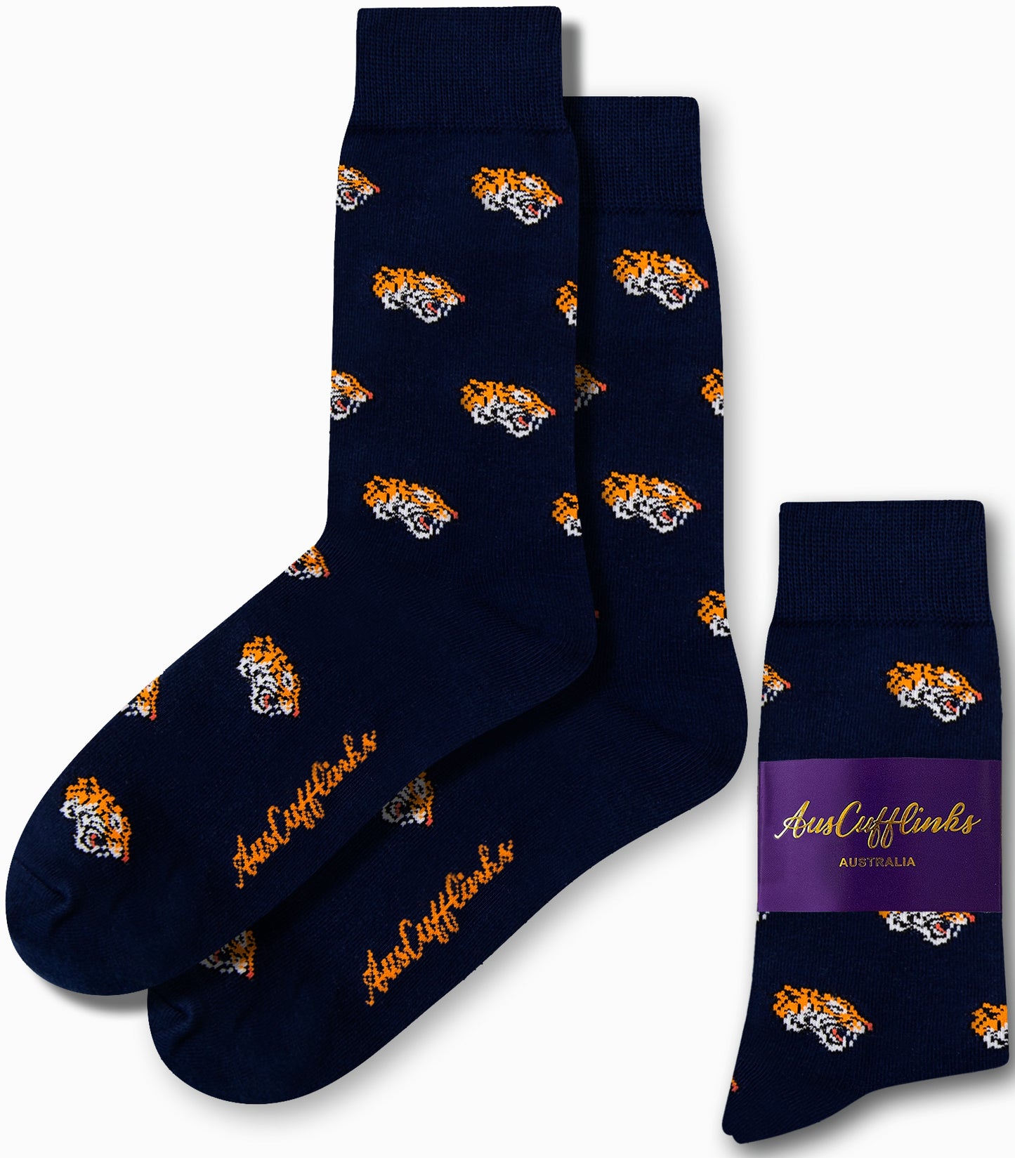 Introducing the "Tiger Socks" in navy blue, showcasing a captivating jungle design adorned with an orange and white tiger head motif. Experience untamed comfort, complete with "AusCufflinks" boldly scripted in orange on the sole.