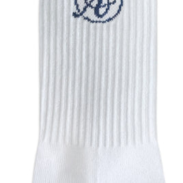 The AusCufflinks Socks are white formal dress socks made from premium cotton, featuring a ribbed texture and a dark blue embroidered encircled “b” logo near the top—ideal for formal sock enthusiasts.