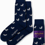 Navy blue socks with playful white dog patterns, featuring a purple label that reads "AusCufflinks Australia." Step up your style game and lead the pack with this charming addition to your wardrobe—introducing the "Wolf Socks.