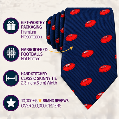 Introducing the AFL Football Skinny Tie—a navy tie adorned with red embroidered footballs, presented in premium packaging. Hand-stitched for quality, this 2.3-inch wide tie is a favorite among fans, boasting over 10,000 five-star reviews from more than 100,000 orders. Celebrate your team spirit with the ideal AFL Football Skinny Tie for dedicated supporters.
