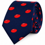 AFL Football Skinny Tie in navy blue, featuring a pattern of small red footballs, rolled up and displayed against a white background—the perfect choice for football supporters who value modern style.