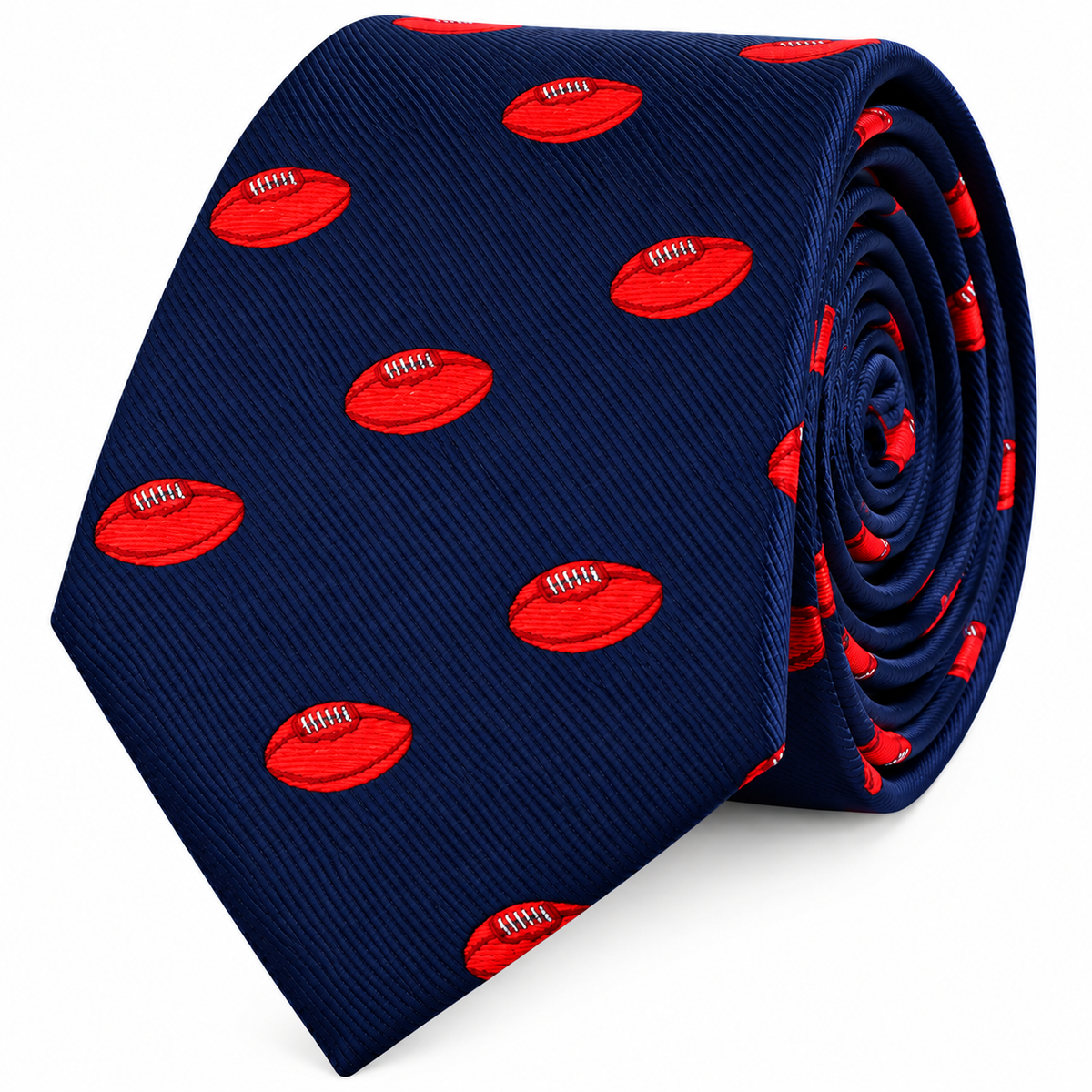 AFL Football Skinny Tie in navy blue, featuring a pattern of small red footballs, rolled up and displayed against a white background—the perfect choice for football supporters who value modern style.