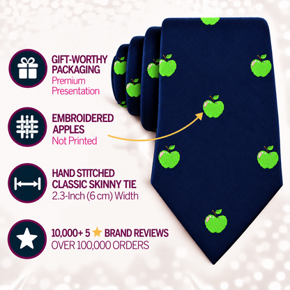 The Apple Skinny Tie is a navy blue men’s slim tie embroidered with green apples, presented in gift-worthy packaging and boasting over 10,000 5-star reviews.