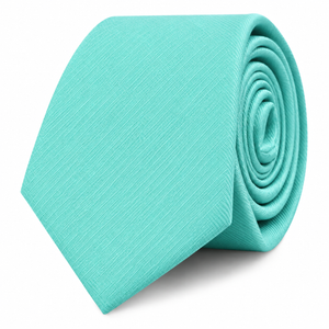 The Aqua Skinny Tie, featuring a neatly rolled design in turquoise with a subtle textured pattern, makes an ideal wedding accessory and is elegantly displayed on a white background.