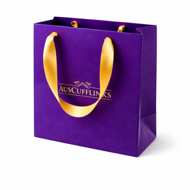 The Retail Gift Bag is a luxury purple bag with a yellow handle and gold "AUSCUFFLINKS" text on the front, displayed against a white background.