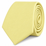 A Baby Yellow Business Cotton Tie, neatly rolled up, is displayed on a white background, making it an ideal wedding accessory for groomsmen.