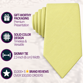 The Baby Yellow Skinny Cotton Tie, featuring a slim 2.3-inch width and solid color elegance, is showcased alongside icons noting its premium gift packaging and impressive record of over 10,000 five-star reviews.