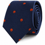 The Basketball Skinny Tie features a navy blue base with a textured pattern and is adorned with small orange basketball motifs evenly spaced across the fabric—making it the perfect basketball gift for enthusiasts and adding sporty flair to any outfit.