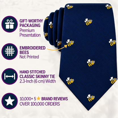 The Bee Skinny Tie in navy blue features embroidered yellow bees and comes with gift packaging, hand-stitched quality, and boasts over 10,000 five-star reviews.
