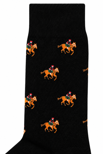 Celebrate the season in style with Black Thoroughbred Horse Racing Socks—festive black socks featuring playful brown horses and riders in red and green, each topped with a Santa hat. Perfect for equestrian holiday fun!.