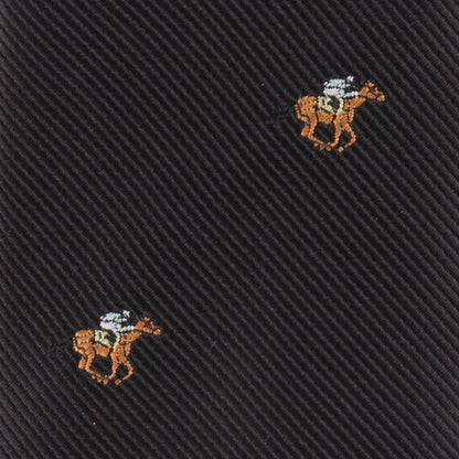 Close-up of the Horse Racing Skinny BLACK Tie, showcasing diagonal ribbed black fabric embroidered with a horse and rider motif in brown, white, and light blue—an elegant accessory for horse racing enthusiasts.