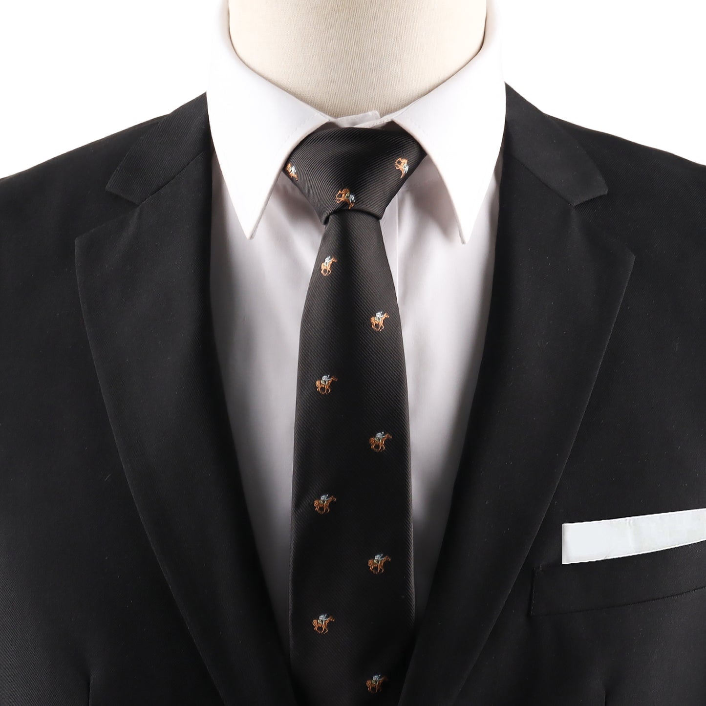 A close-up of a person wearing a black suit, white shirt, Horse Racing Skinny BLACK Tie with small pattern, and a white pocket square.