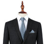 A mannequin dressed in a dark suit, white shirt, and a Blue Flower Grey Business Tie & Pocket Square Set.