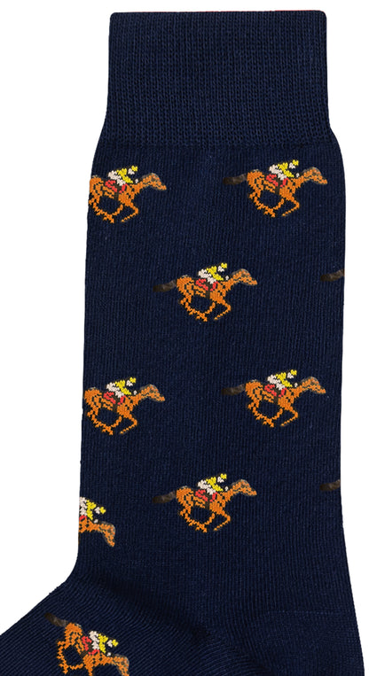 Melbourne Race Horse Socks—navy blue socks with a pattern of pixelated yellow racehorses and red-and-white jockeys; a fun, quirky gift for racing fans.