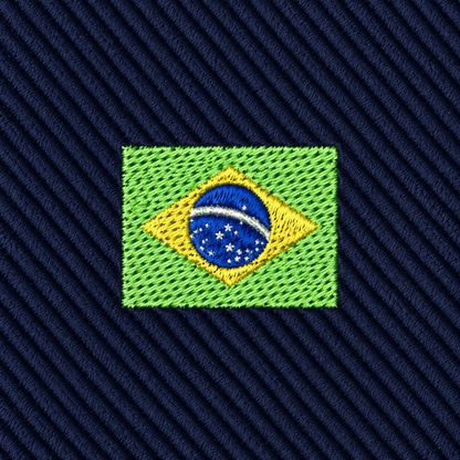 Embroidered patch of the Brazil flag on dark blue diagonal fabric background, featuring green, yellow, blue, and white thread details—perfect for adding a touch of Brazilian pride to the Brazil Flag Skinny Tie.