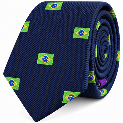 A Brazil Flag Skinny Tie in navy blue for men, featuring a repeating pattern of small Brazilian flags, rolled up with the tip facing forward.