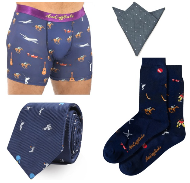 The Swimming Bundle is a men's accessory set with boxers, a pocket square, tie, and socks featuring sports and musical instrument designs on navy backgrounds.