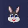 The Bunny Skinny Tie features an embroidered cartoon rabbit face with blue and brown eyes, gray and white fur, and pink inner ears on a dark blue fabric background—perfect for adding playful charm to any animal print or novelty tie collection.