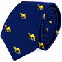 Camel Skinny Tie in blue, featuring a repeating pattern of small yellow camels and rolled up with the pointed end visible.