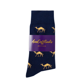 Camel Socks in navy blue with a repeating yellow camel pattern, packaged with a purple AusCufflinks Australia label—perfect as a unique gift for animal lovers.