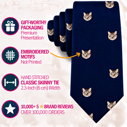 A navy blue Cat Skinny Tie with embroidered cat faces, shown with its gift-worthy packaging, 2.3-inch width, and brand review statistics.