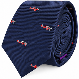 Classic Aircraft Skinny Tie in navy blue, adorned with a pattern of small red and white airplane illustrations, rolled up with the pointed end facing forward. This stylish aircraft print tie is a thoughtful gift for pilots or aviation enthusiasts.