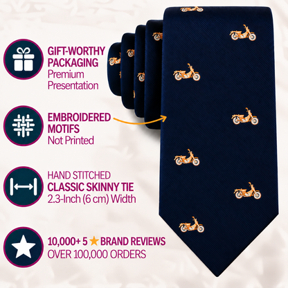 The Classic Motorbike Skinny Tie in navy blue features small embroidered orange motorcycle motifs—ideal as a biker gift or vintage motorbike necktie. It boasts premium gift packaging, detailed embroidery, a versatile 2.3-inch width, and has received over 10,000 five-star reviews.
