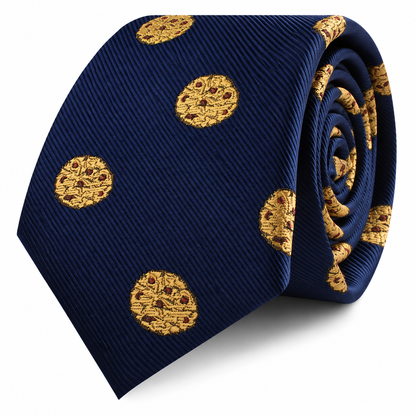 Presenting the Cookies Skinny Tie, a navy blue skinny tie featuring a playful pattern of yellow cookie-like circles, displayed rolled up on a white background.
