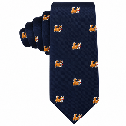 Introducing the Corgi Dog Skinny Tie—a navy blue necktie adorned with a repeating pattern of small orange dogs wearing red and white party hats. This playful novelty tie is the perfect gift for any dog lover.