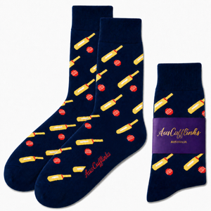 Cricket Bat & Ball Socks in navy blue with yellow bat and red ball design, displayed flat and folded with an AusCufflinks Australia label—ideal cricket gifts for fans.