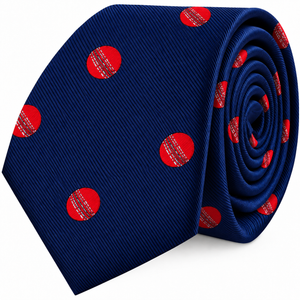 A rolled-up Cricket Skinny Tie in navy blue featuring a pattern of red cricket balls—an ideal cricket gift for any enthusiast.