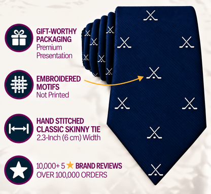 The Crossed Ice Hockey Skinny Tie is a navy blue tie adorned with white crossed stick motifs, highlighted by its embroidered design, elegant gift packaging, and excellent customer ratings.