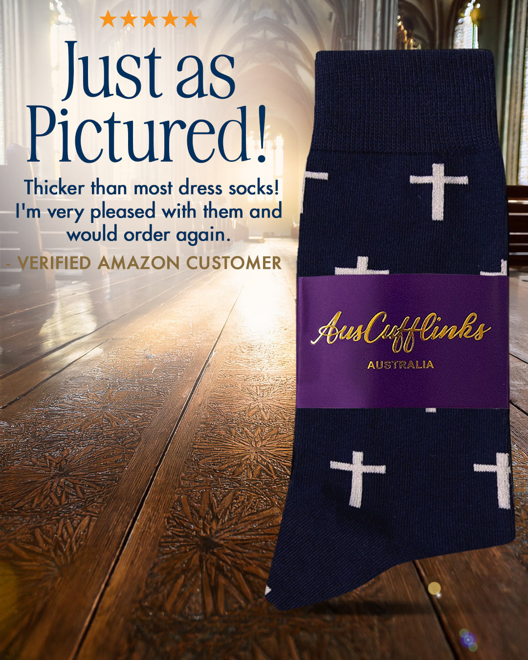 A pair of navy "Jesus The Redeemer Socks" with white cross patterns, wrapped in a purple "AussieCufflinks AUSTRALIA" label, displayed inside a church.