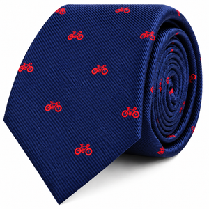 Add a touch of cycling-inspired style to your wardrobe with the Cyclist Skinny Tie—navy blue and adorned with a pattern of small red bicycle icons evenly spaced across the fabric. Shown rolled up, this unique bike print tie is an ideal gift for any cyclist.