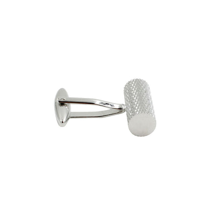 The Cylinder Cufflinks – Sleek Modern Style for Men are shown on a white background, featuring a textured silver cylindrical design—an elegant accessory for formal wear.