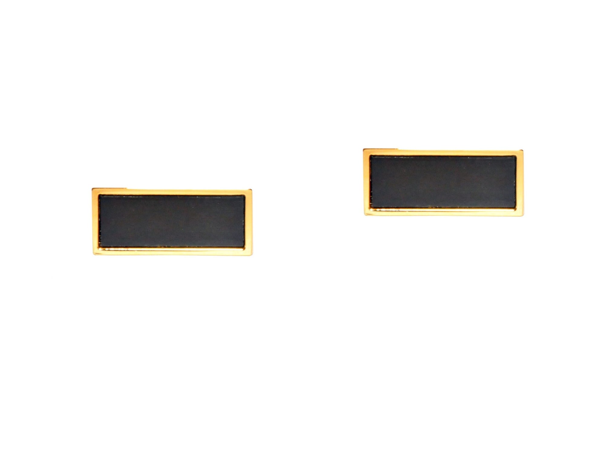 The Black & Gold Cufflinks radiate an aura of mysterious midnight charm against a pristine white background, with their rectangular black design and elegant gold edges.