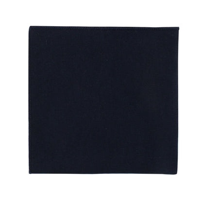 A timeless, square-shaped black cloth napkin exuding elegance is featured against a white background from the Dark Forest Navy Cotton Bow Tie & Pocket Square Set.