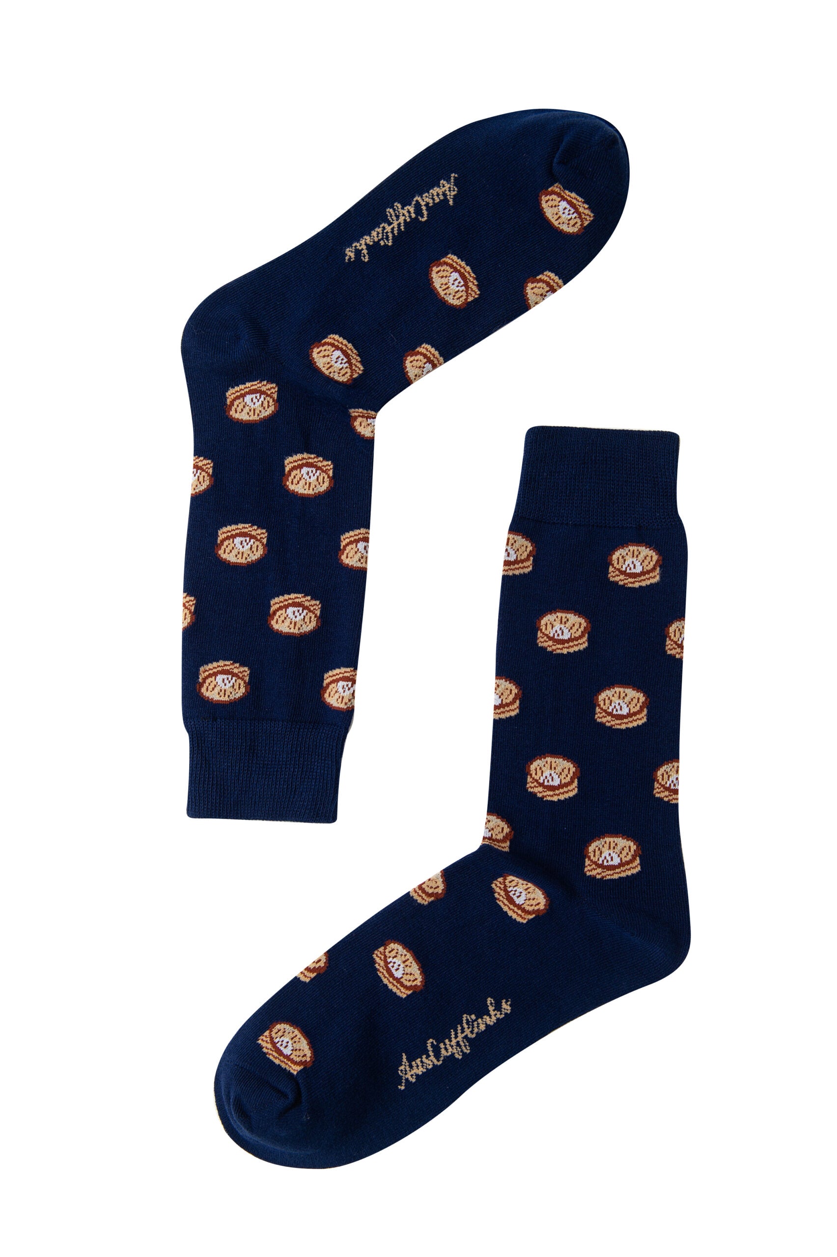 A pair of Dimsum Socks with brown food stains.