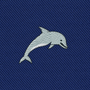 Showcase your style with the Dolphin Skinny Tie, featuring an embroidered gray dolphin on a textured blue fabric—perfect for anyone seeking unique, marine-inspired fashion accessories.