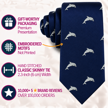 The Dolphin Skinny Tie features a rich navy blue design adorned with embroidered dolphin motifs, and is presented with text showcasing its gift packaging, classic width, hand-stitched details, and strong customer reviews—making it an exceptional choice for anyone searching for a distinctive marine-inspired accessory.
