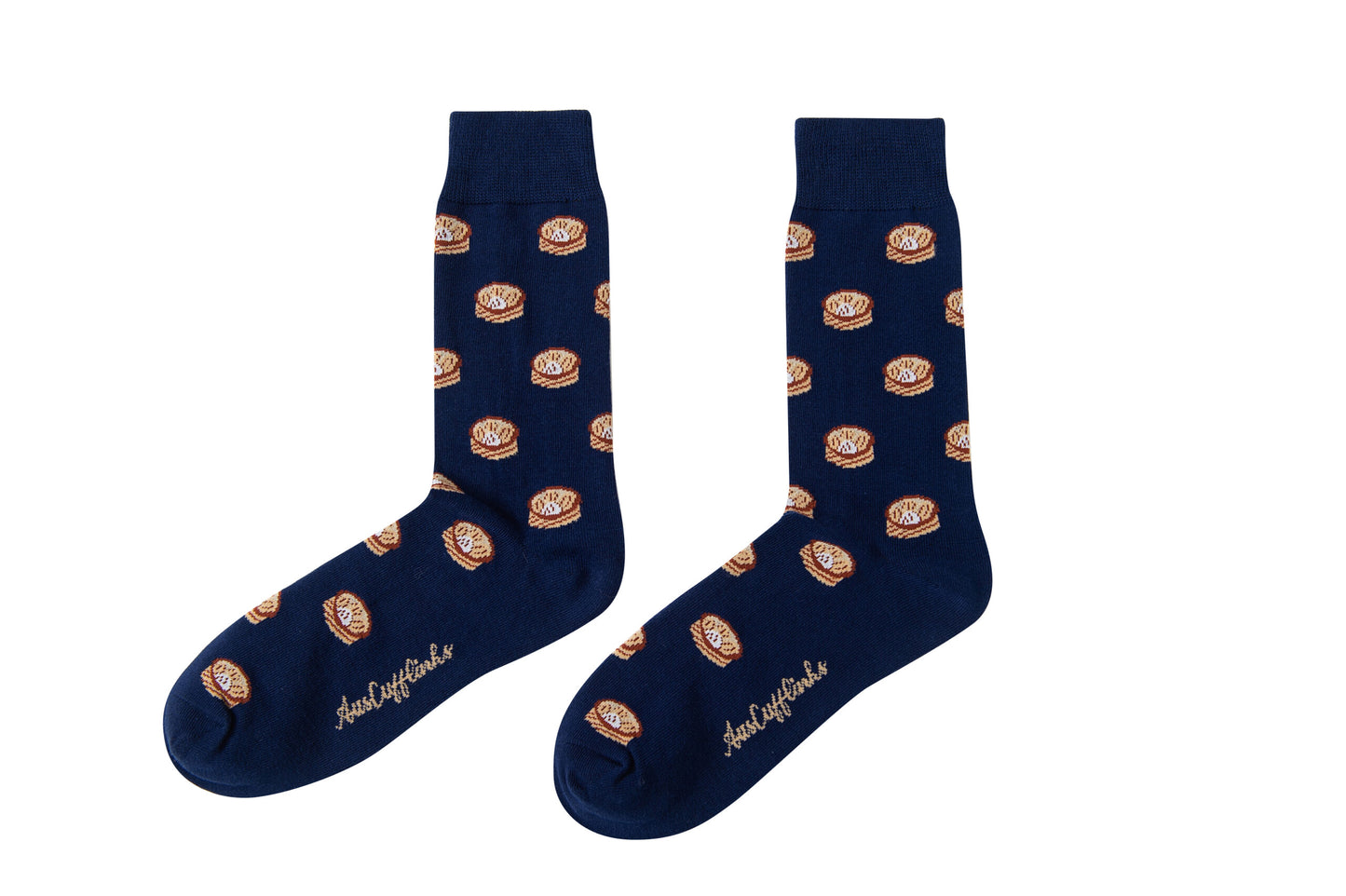A pair of Dumpling Socks with food on them.