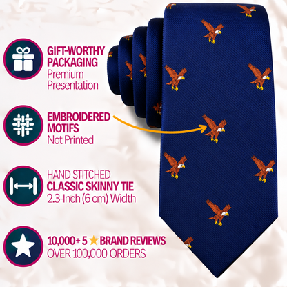 The Eagle Bird Skinny Tie in navy features embroidered eagle motifs and comes with gift packaging, expert hand stitching, a sleek 2.3-inch width, and boasts over 10,000 five-star reviews from more than 100,000 orders.